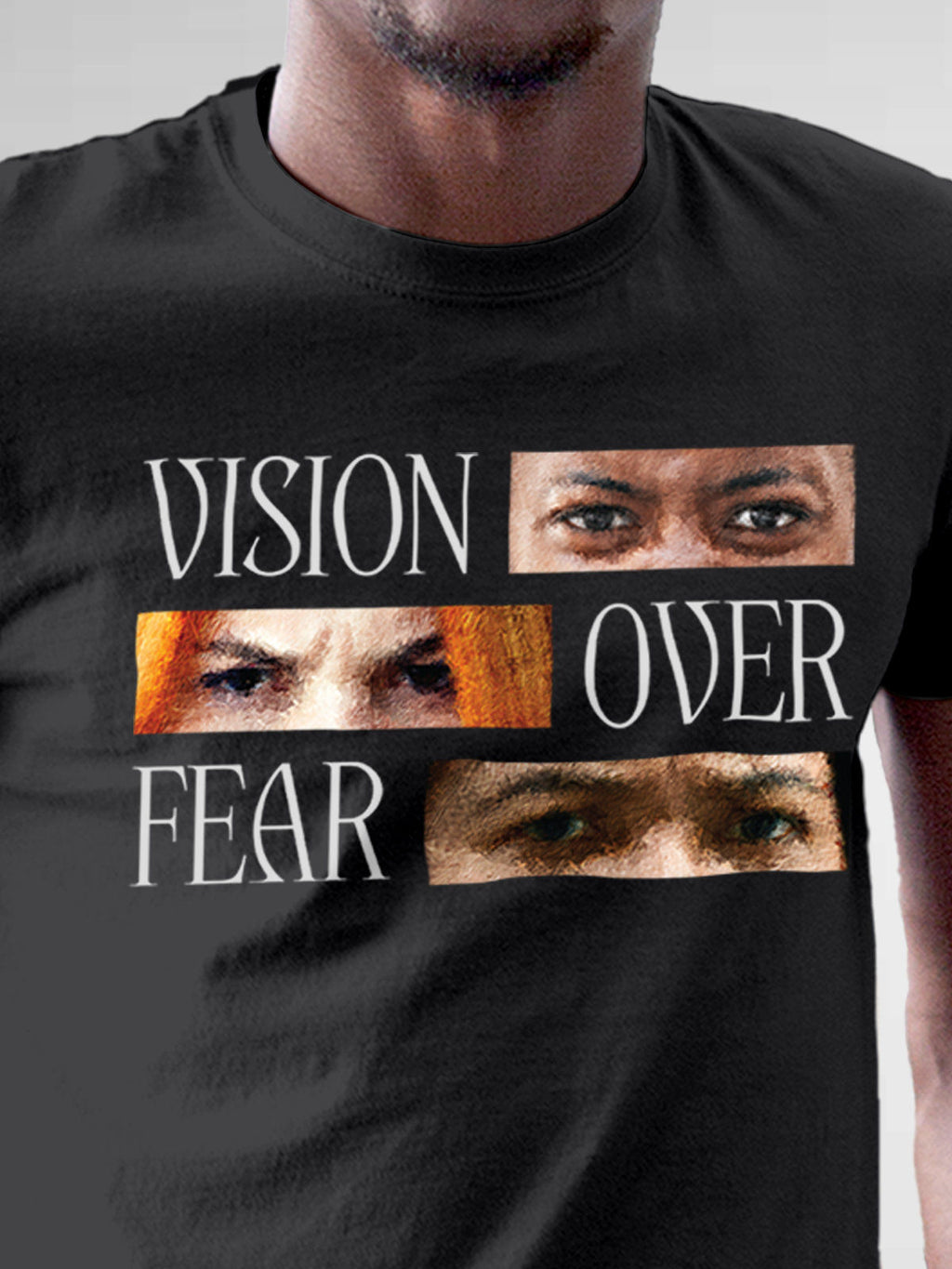 Close up of 'Vision Over Fear' design on Men's Dark Grey Round Neck T-shirt, highlighting intricate details and vibrant print.