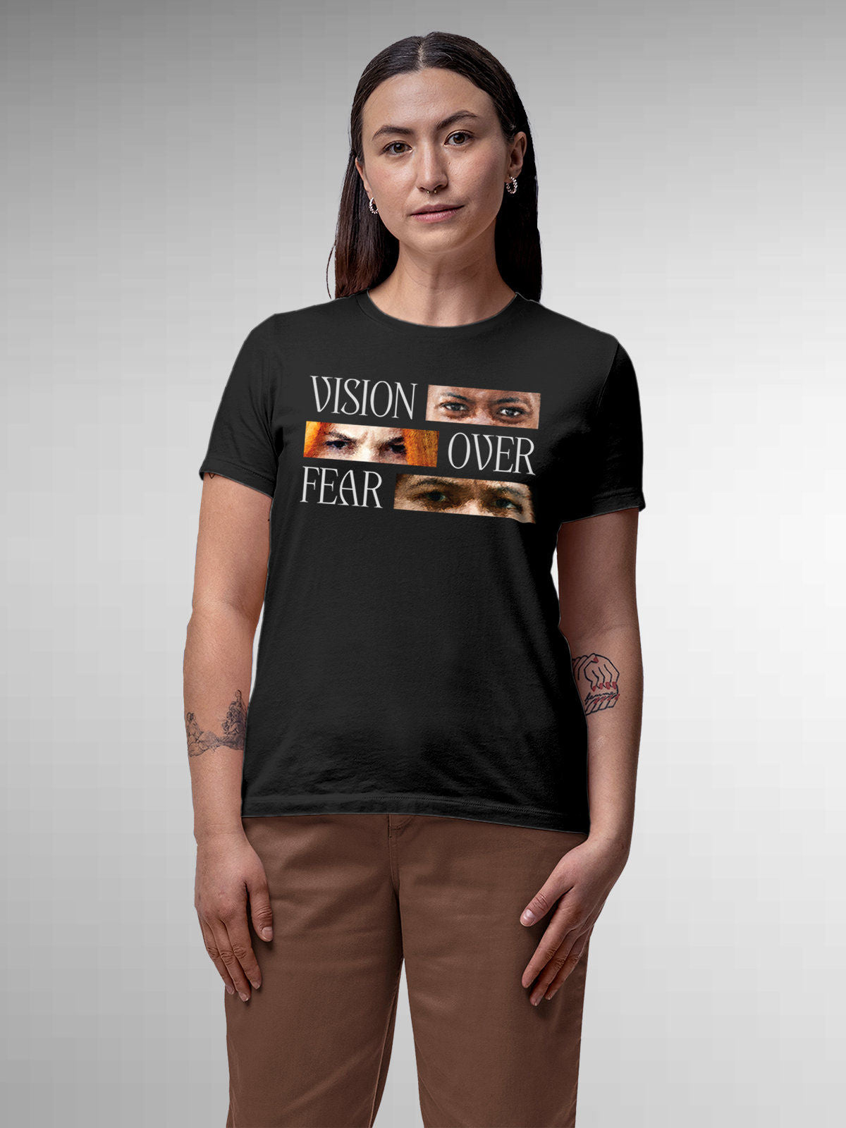 Model wearing Women's Dark Grey Round Neck T-shirt with 'Vision Over Fear' design, offering effortless style and premium comfort