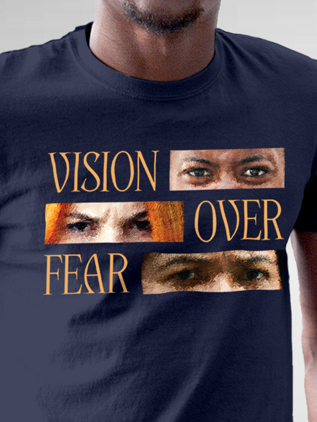 Close up of 'Vision Over Fear' design on Men's Navy Blue Round Neck T-shirt, highlighting intricate details and vibrant print.