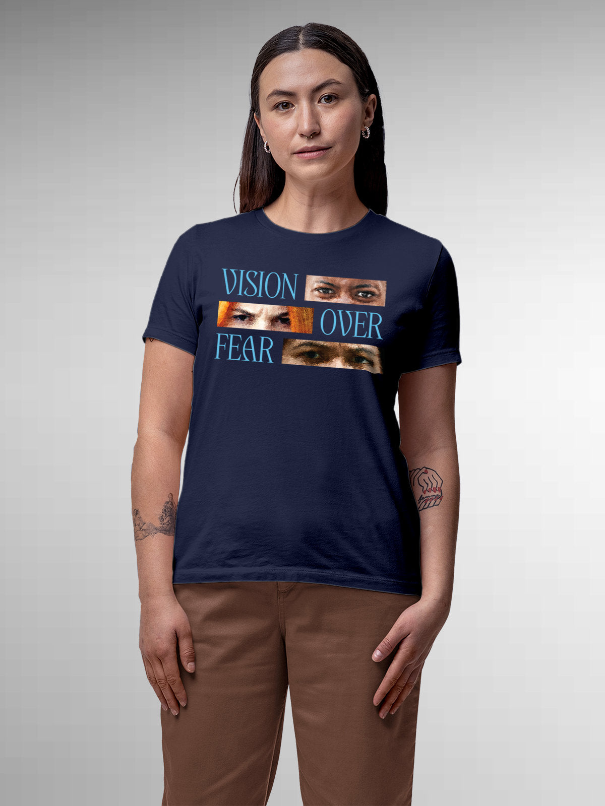Model wearing Women's Navy Blue Round Neck T-shirt with 'Vision Over Fear' design, offering effortless style and premium comfort