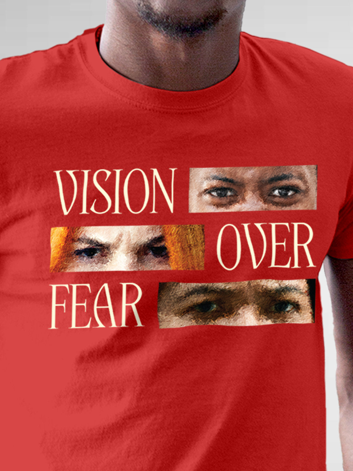 Close up of 'Vision Over Fear' design on Men's Red Round Neck T-shirt, highlighting intricate details and vibrant print.