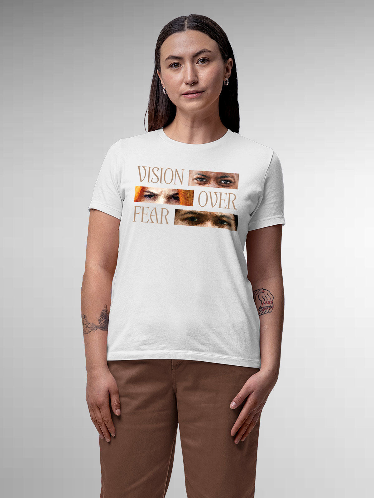 Model wearing Women's White Round Neck T-shirt with 'Vision Over Fear' design, offering effortless style and premium comfort