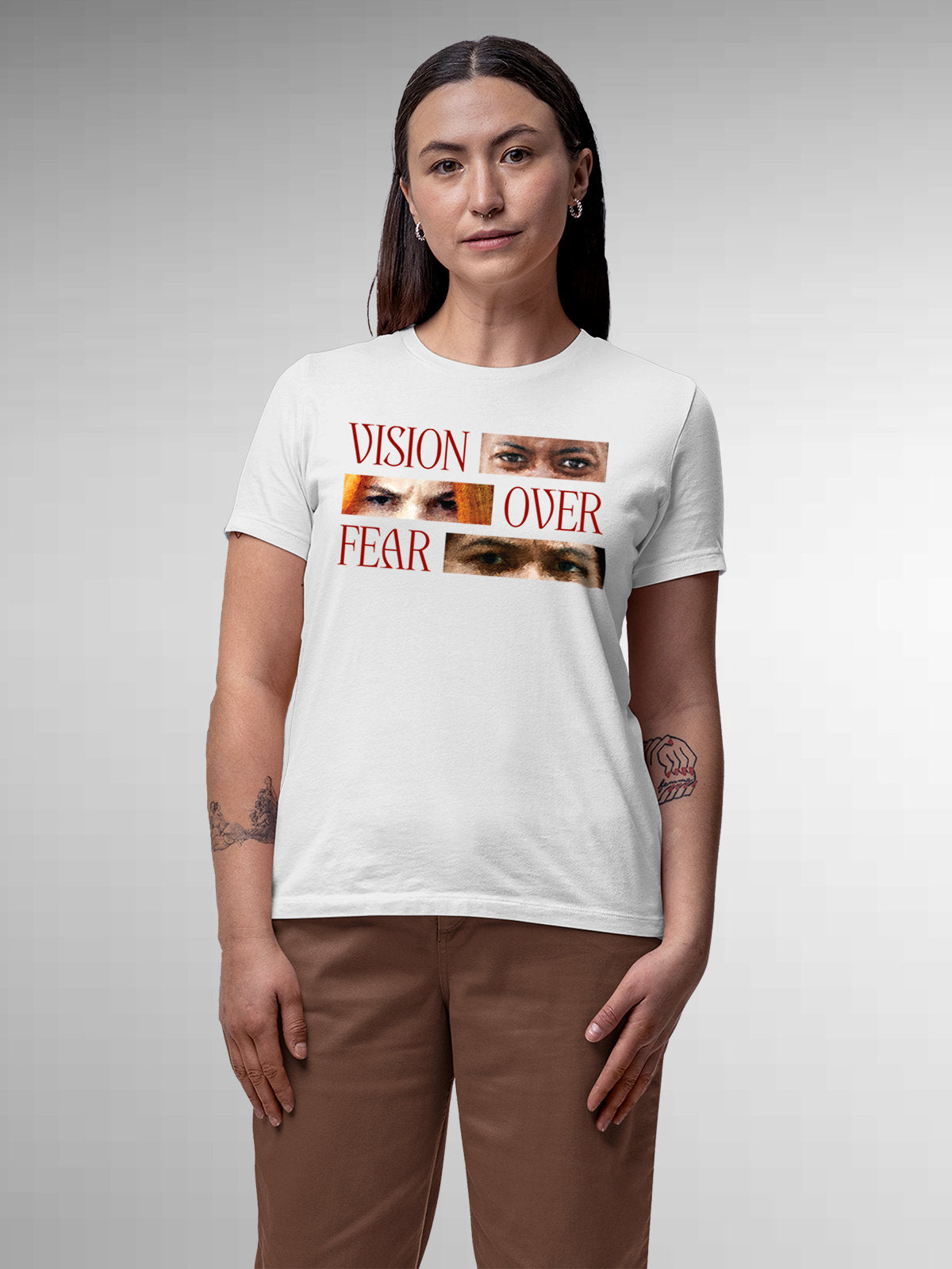 Model wearing Women's White Round Neck T-shirt with 'Vision Over Fear' design, offering effortless style and premium comfort
