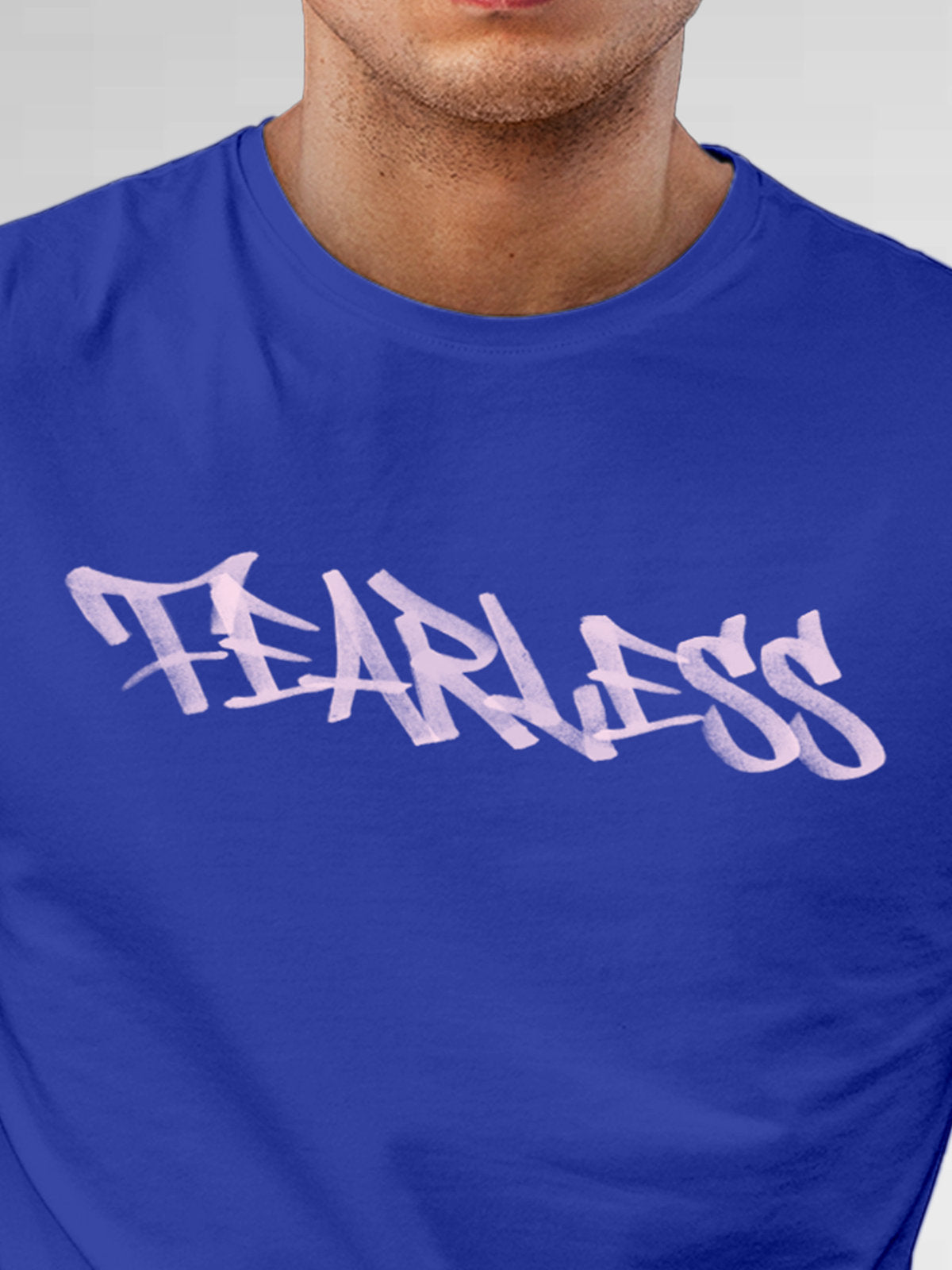 Close up of 'Fearless' design on Men's Blue Round Neck T-shirt, highlighting intricate details and vibrant print.
