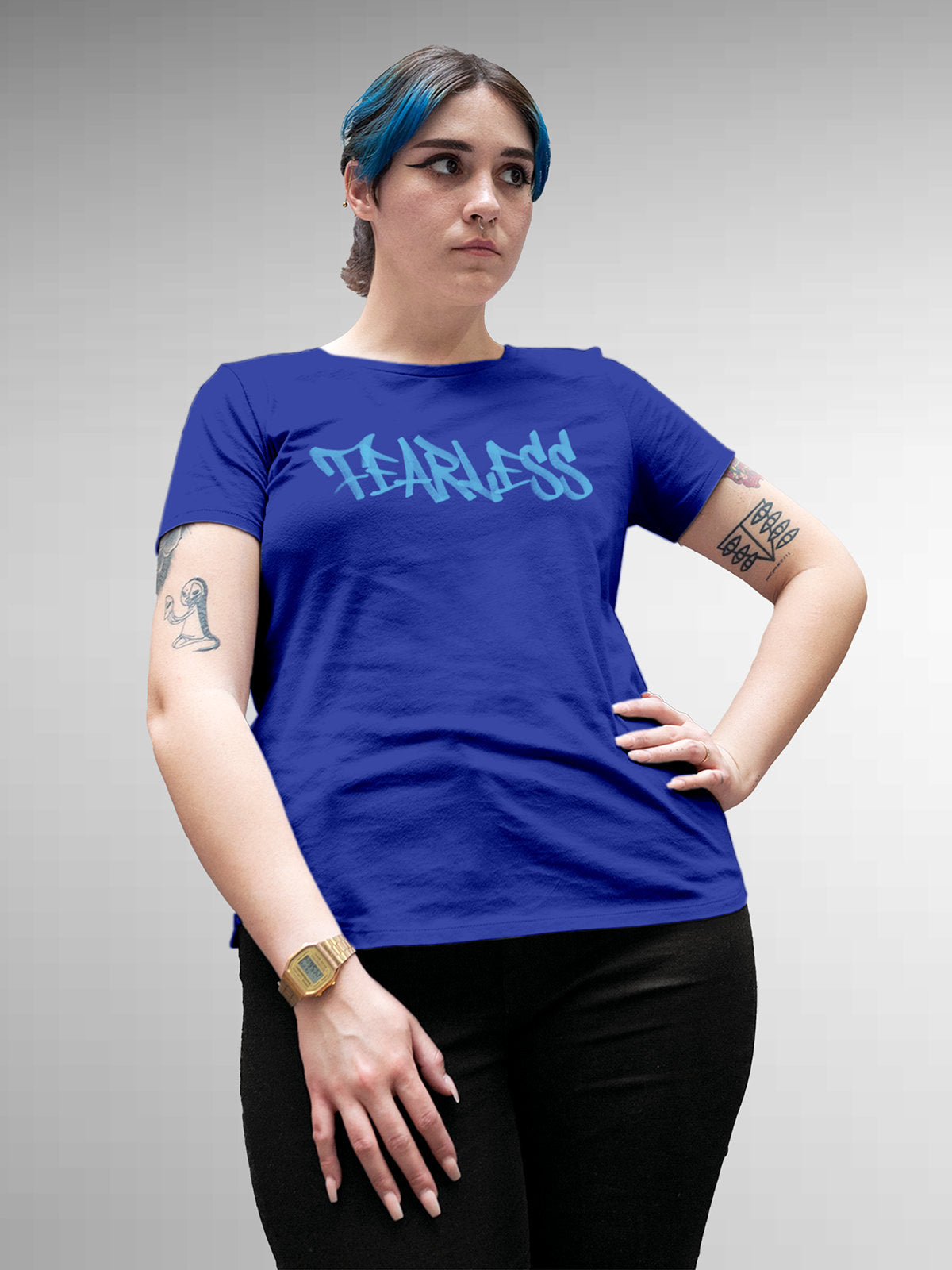 Model wearing Women's Blue Round Neck T-shirt with 'Fearless' design, offering effortless style and premium comfort