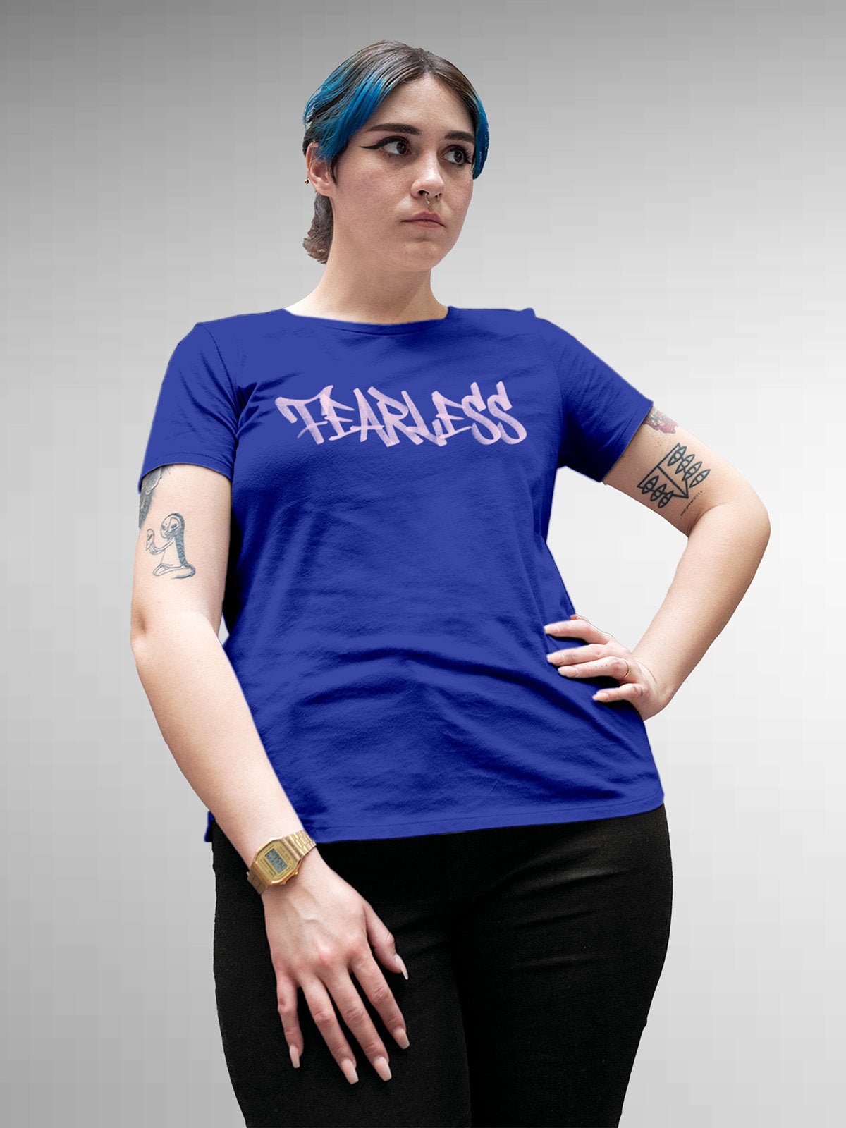 Model wearing Women's Blue Round Neck T-shirt with 'Fearless' design, offering effortless style and premium comfort