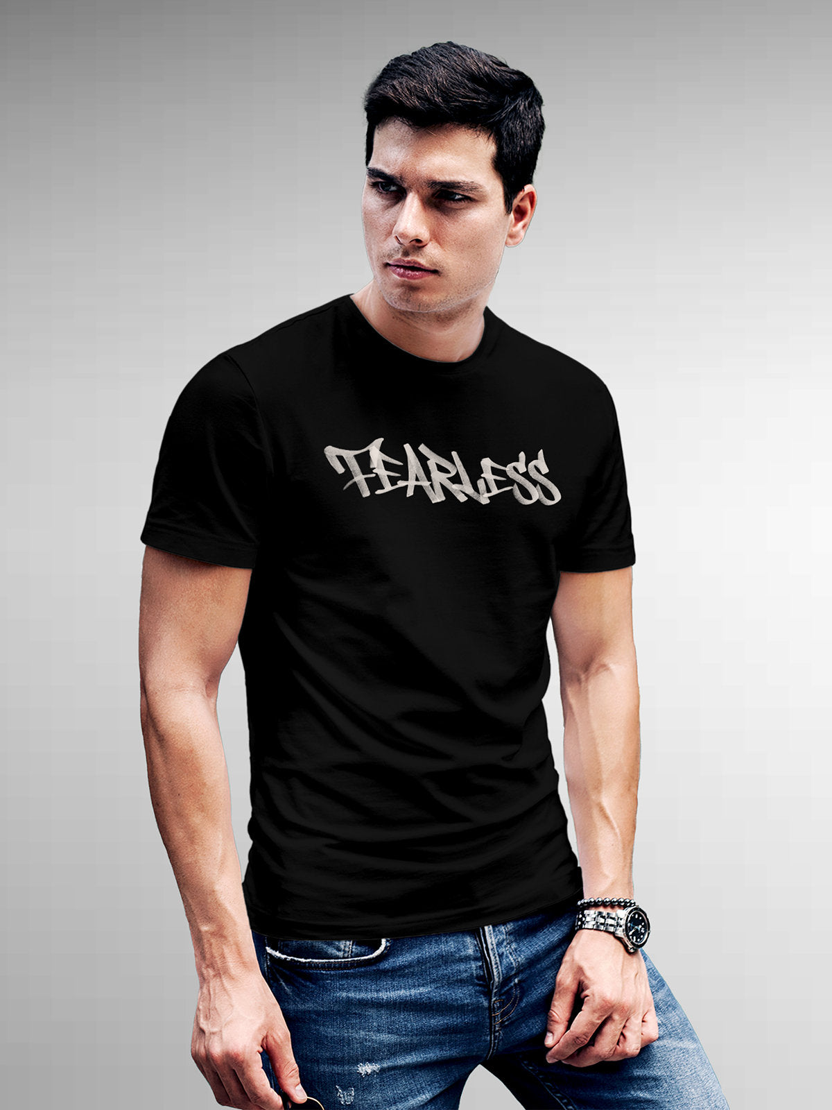 Model wearing Men's Black Round Neck T-shirt with 'Fearless' design, offering effortless style and premium comfort