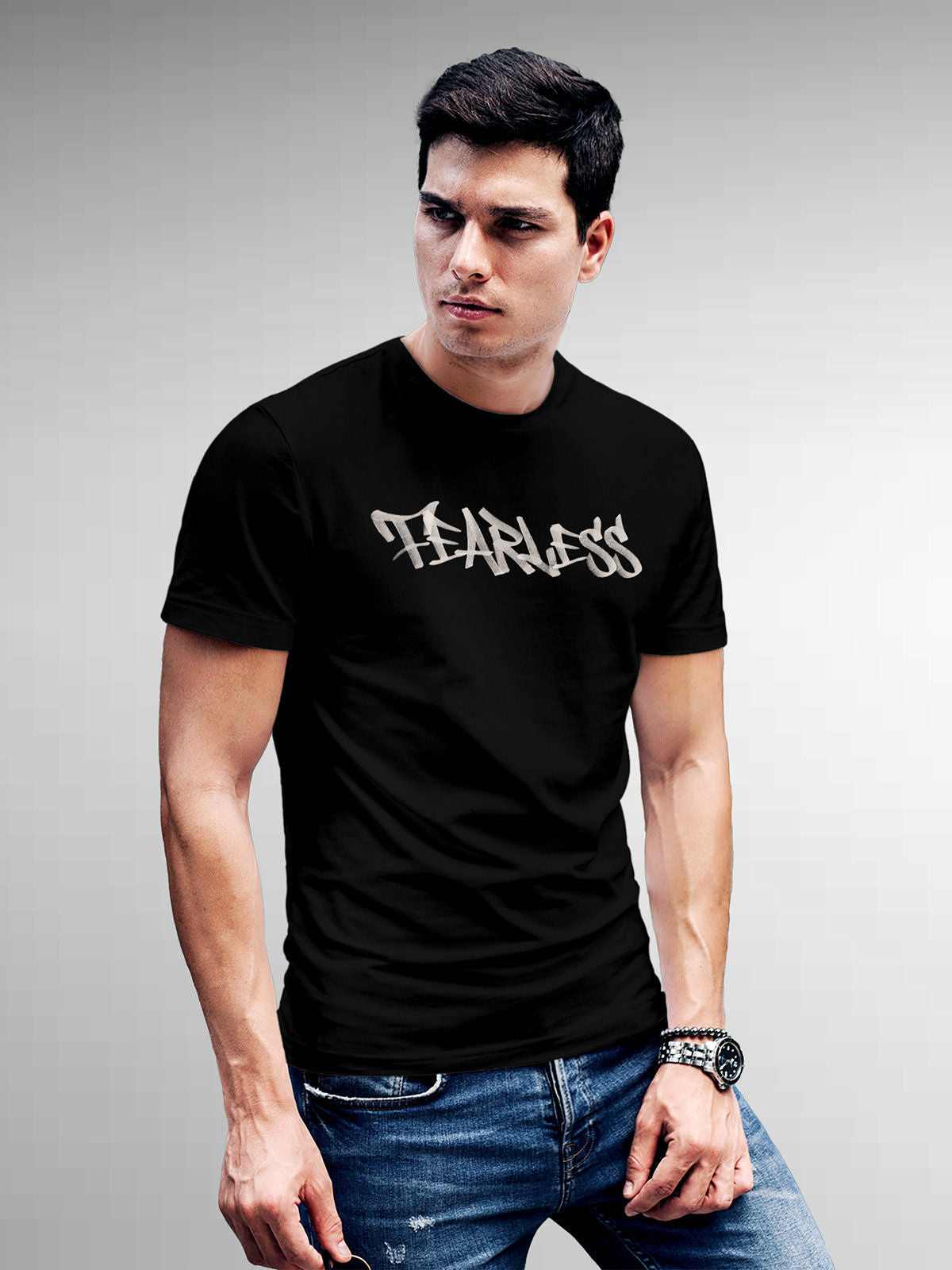 Model wearing Men's Black Round Neck T-shirt with 'Fearless' design, offering effortless style and premium comfort