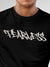 Close up of 'Fearless' design on Men's Black Round Neck T-shirt, highlighting intricate details and vibrant print.