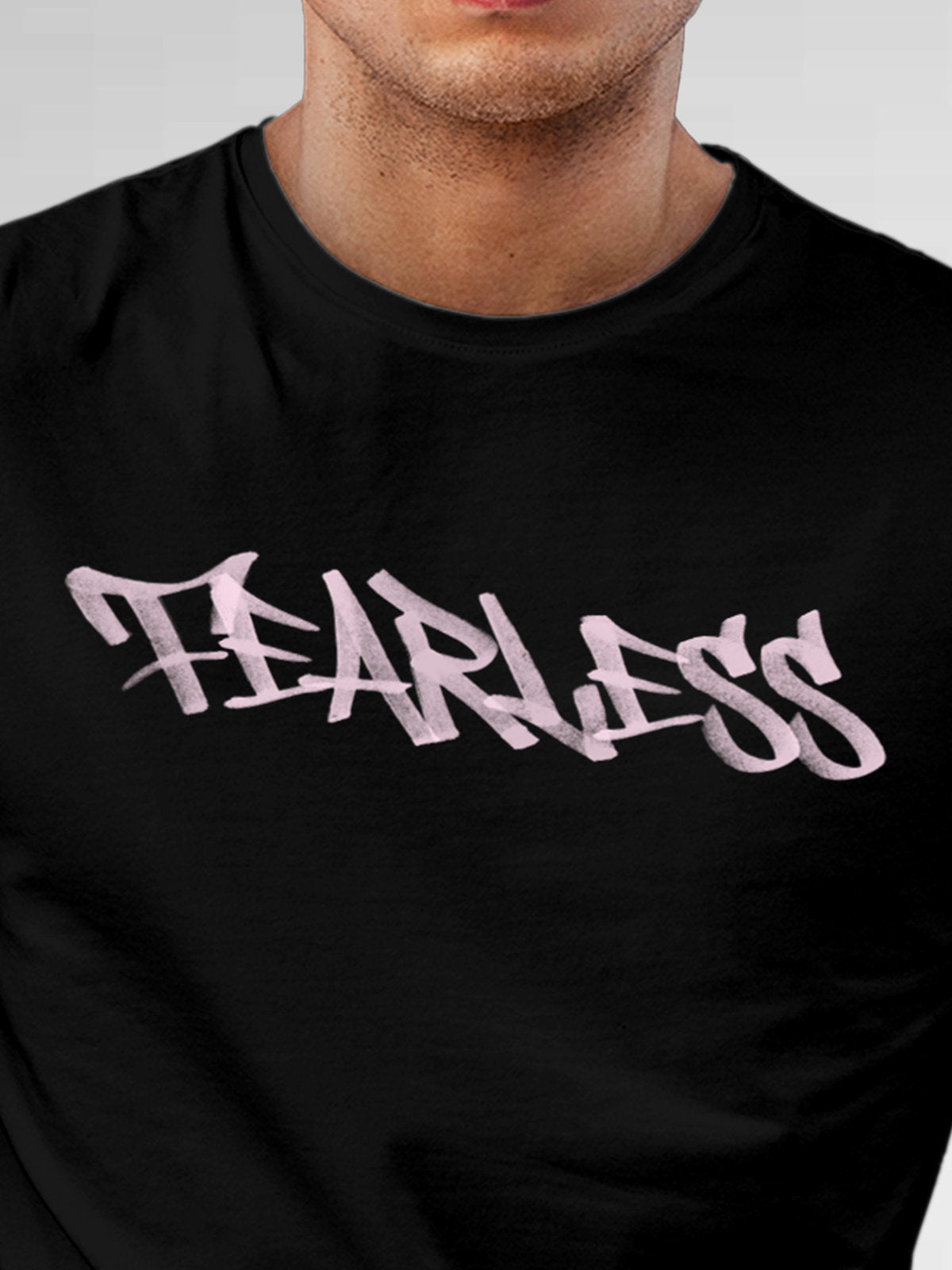 Close up of 'Fearless' design on Men's Black Round Neck T-shirt, highlighting intricate details and vibrant print.