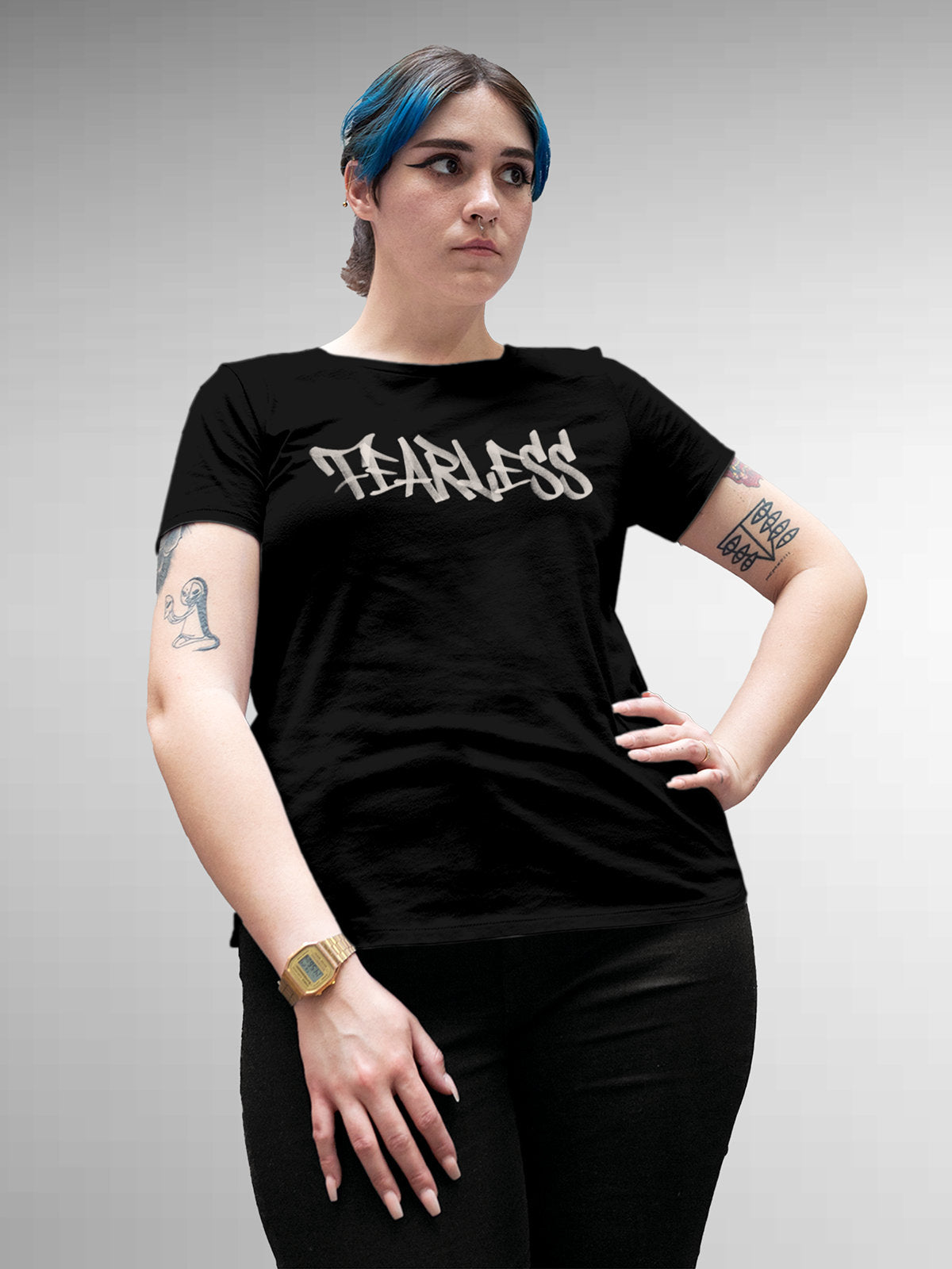 Model wearing Women's Black Round Neck T-shirt with 'Fearless' design, offering effortless style and premium comfort