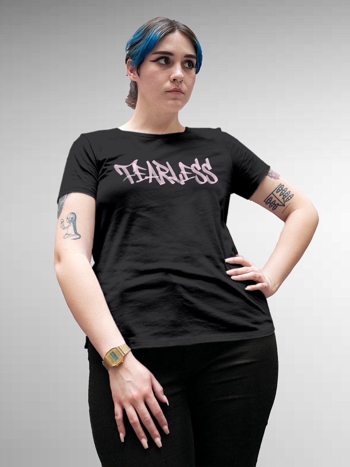 Model wearing Women's Dark Grey Round Neck T-shirt with 'Fearless' design, offering effortless style and premium comfort
