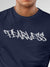 Close up of 'Fearless' design on Men's Navy Blue Round Neck T-shirt, highlighting intricate details and vibrant print.