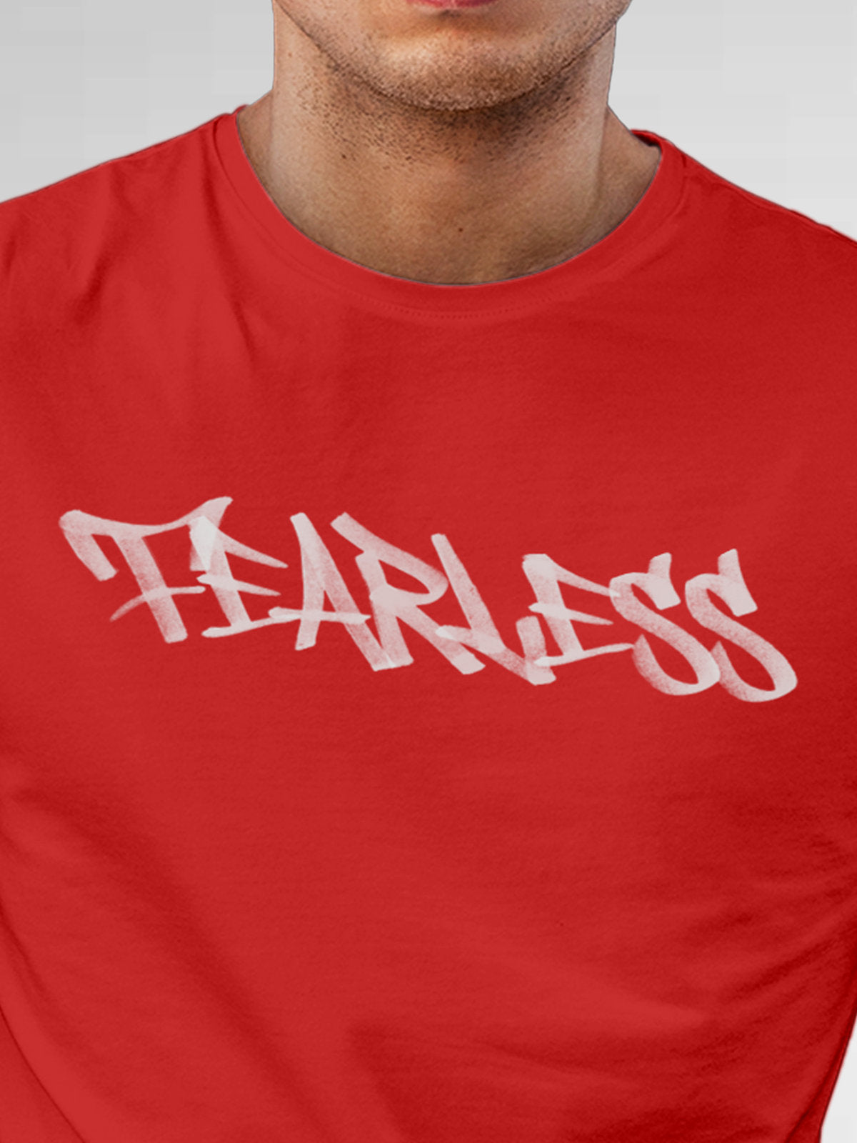 Close up of 'Fearless' design on Men's Red Round Neck T-shirt, highlighting intricate details and vibrant print.