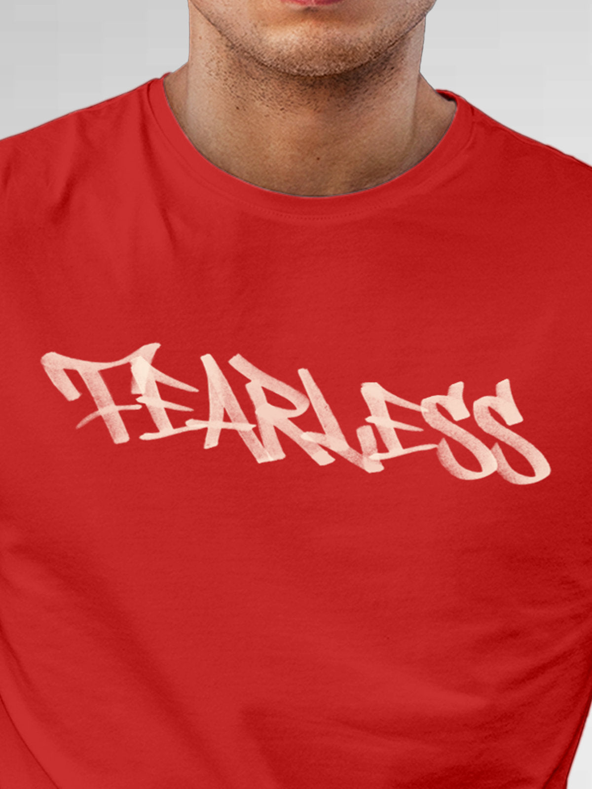 Close up of 'Fearless' design on Men's Red Round Neck T-shirt, highlighting intricate details and vibrant print.