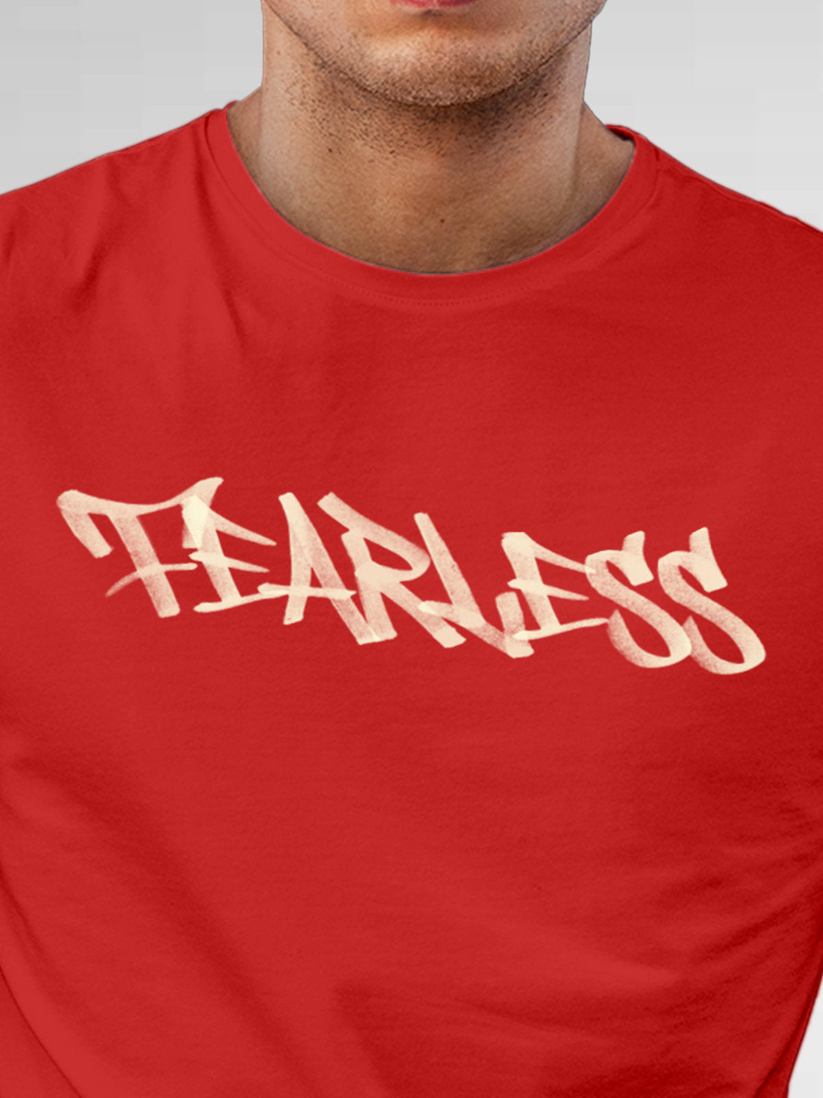 Close up of 'Fearless' design on Men's Red Round Neck T-shirt, highlighting intricate details and vibrant print.