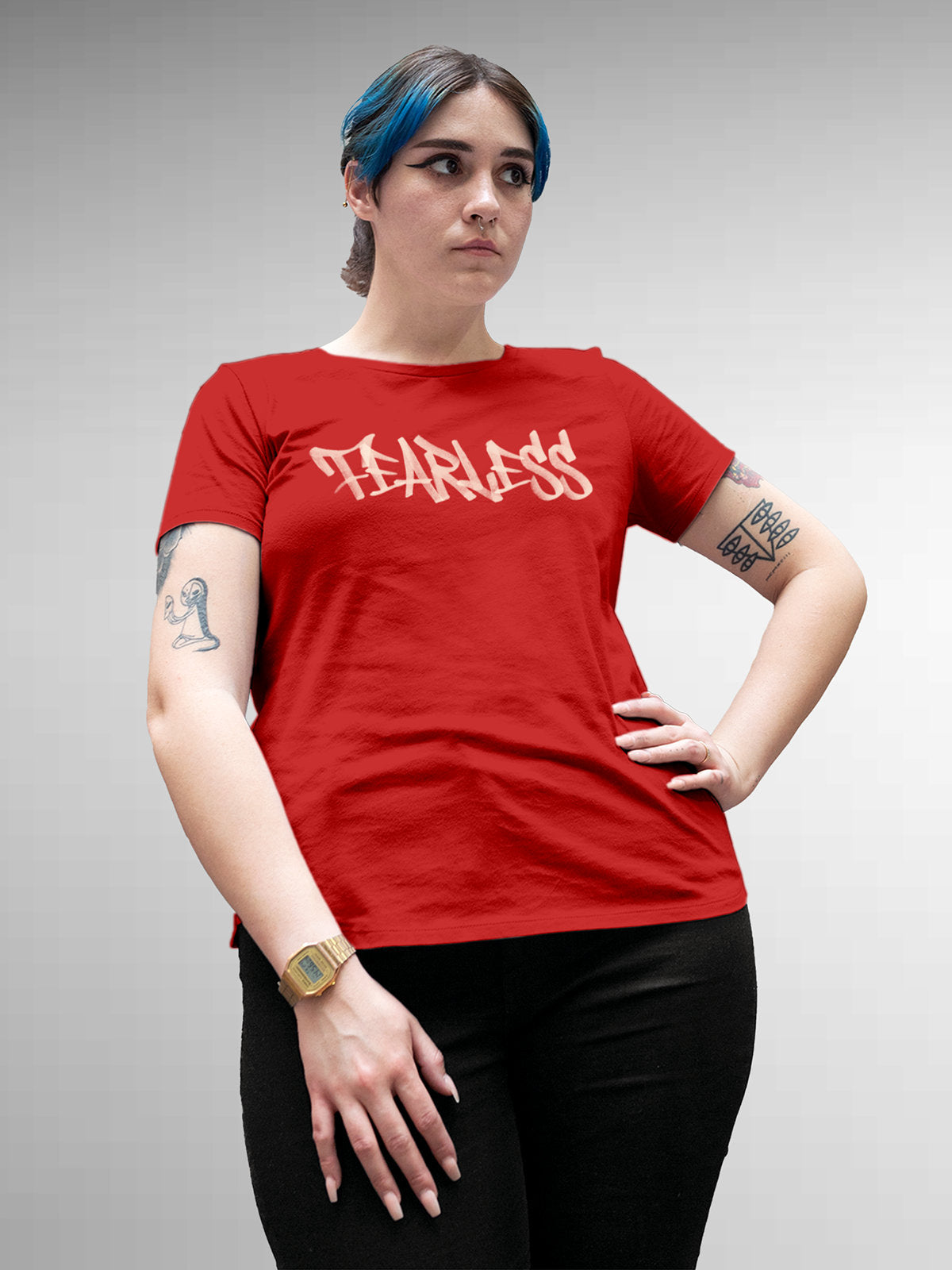 Model wearing Women's Red Round Neck T-shirt with 'Fearless' design, offering effortless style and premium comfort