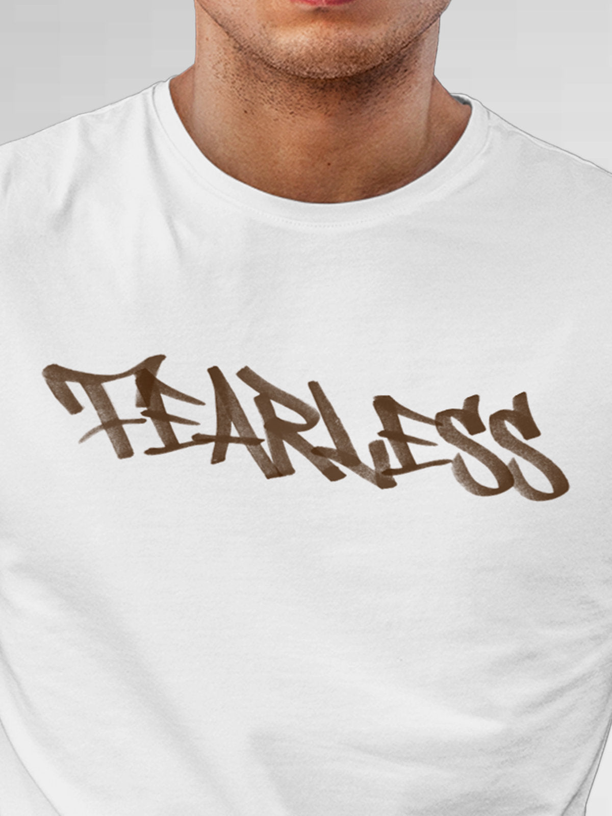 Close up of 'Fearless' design on Men's White Round Neck T-shirt, highlighting intricate details and vibrant print.