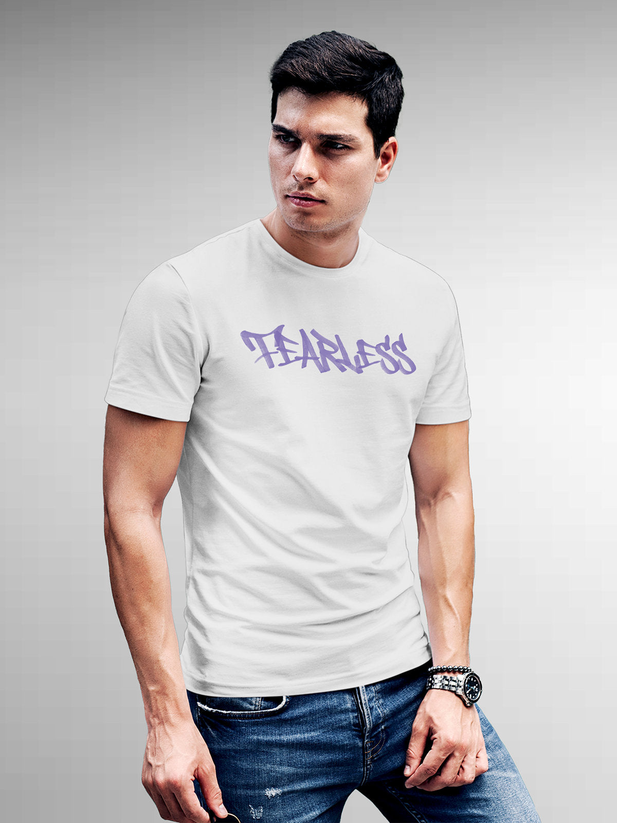 Model wearing Men's White Round Neck T-shirt with 'Fearless' design, offering effortless style and premium comfort