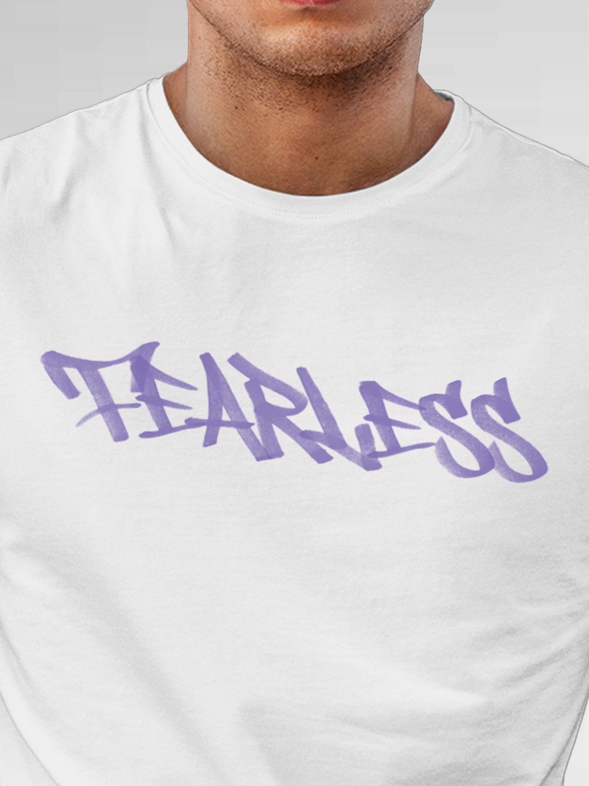 Close up of 'Fearless' design on Men's White Round Neck T-shirt, highlighting intricate details and vibrant print.