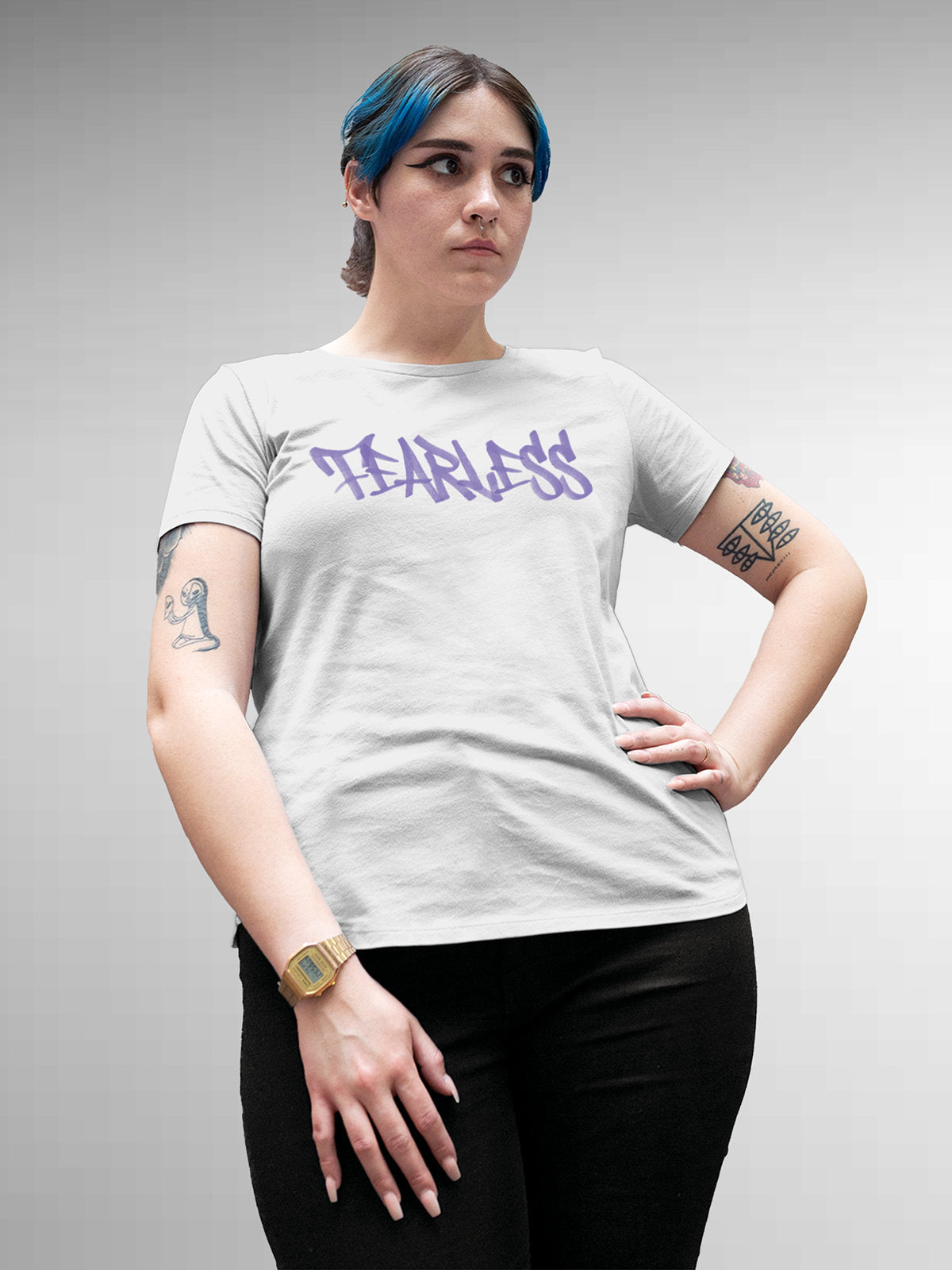 Model wearing Women's White Round Neck T-shirt with 'Fearless' design, offering effortless style and premium comfort