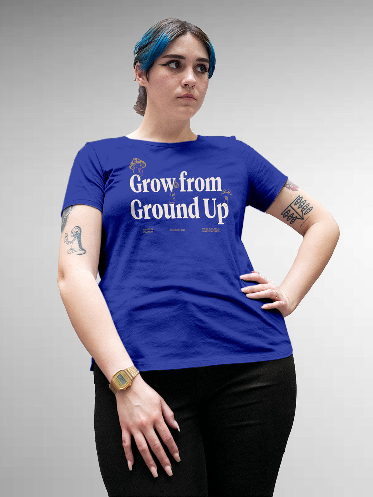 Model wearing Women's Blue Round Neck T-shirt with 'Grow From Ground Up' design, offering effortless style and premium comfort