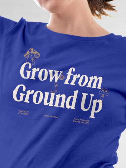 Close up of 'Grow From Ground Up' design on Women's Blue Round Neck T-shirt, highlighting intricate details and vibrant print.