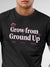 Close up of 'Grow From Ground Up' design on Men's Dark Grey Round Neck T-shirt, highlighting intricate details and vibrant print.