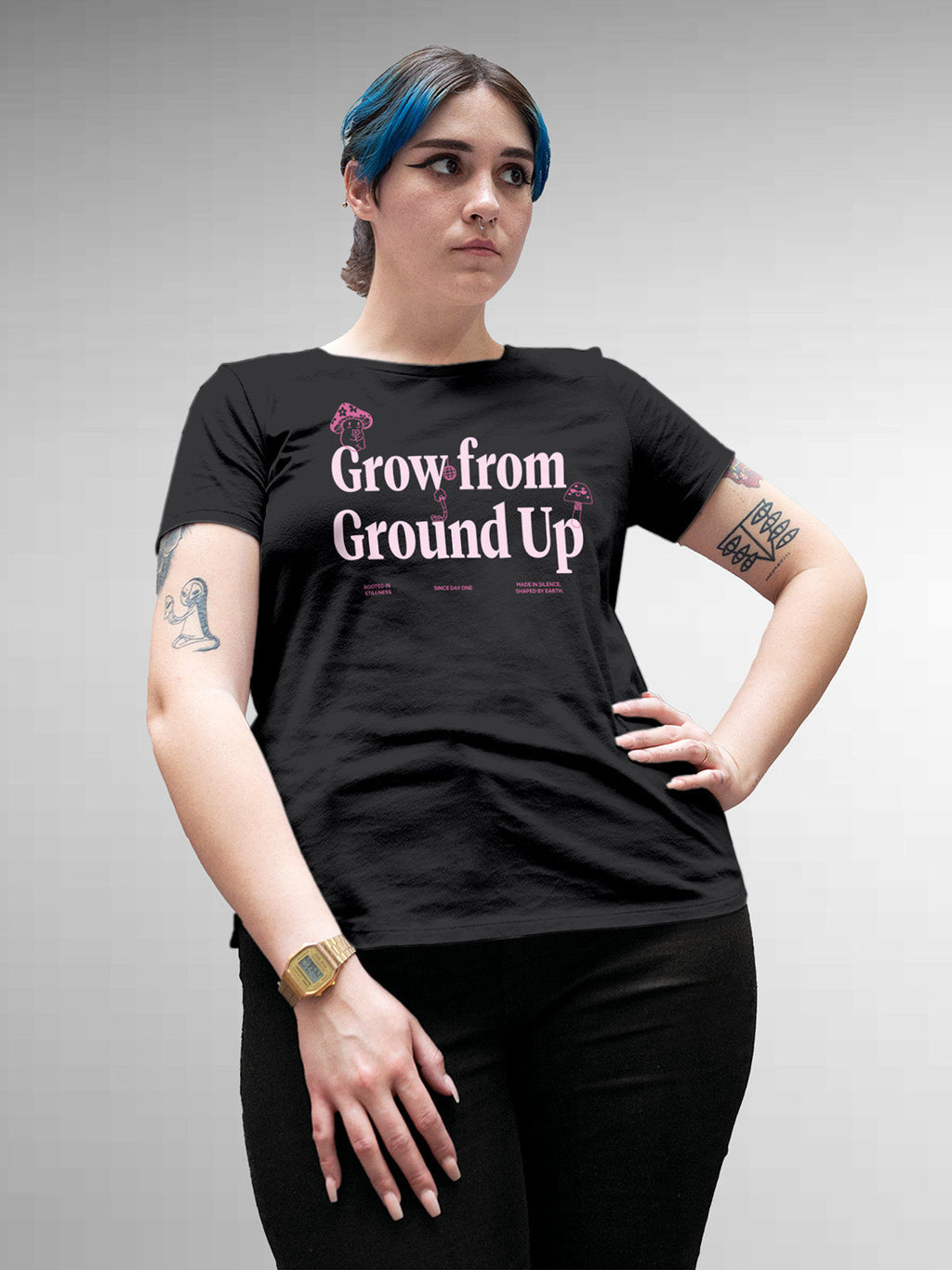 Model wearing Women's Dark Grey Round Neck T-shirt with 'Grow From Ground Up' design, offering effortless style and premium comfort