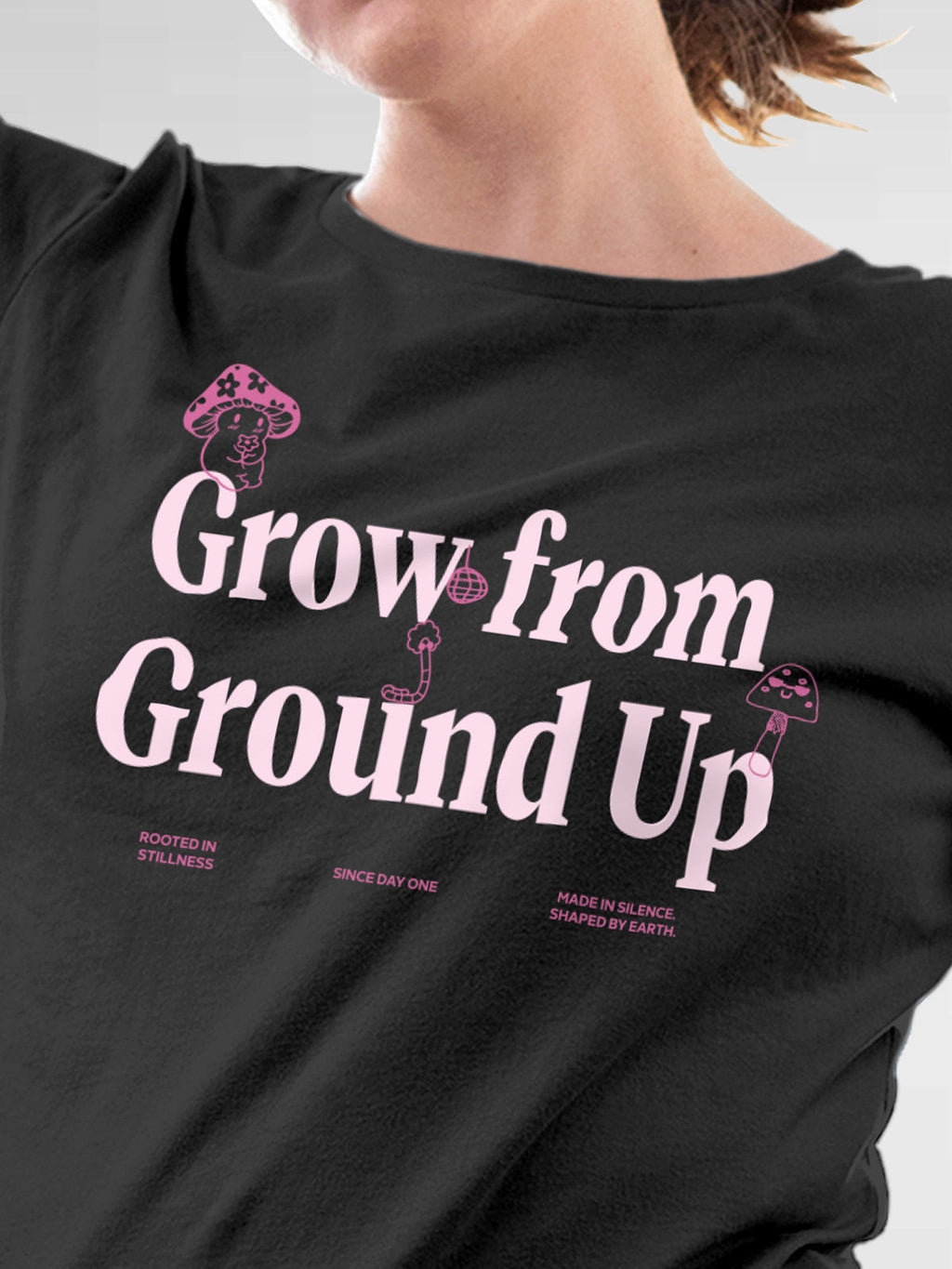 Close up of 'Grow From Ground Up' design on Women's Dark Grey Round Neck T-shirt, highlighting intricate details and vibrant print.