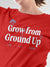 Close up of 'Grow From Ground Up' design on Women's Red Round Neck T-shirt, highlighting intricate details and vibrant print.
