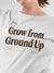 Close up of 'Grow From Ground Up' design on Women's White Round Neck T-shirt, highlighting intricate details and vibrant print.
