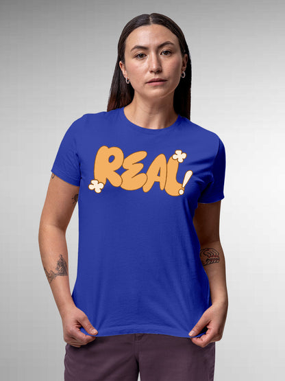 Model wearing Women's Blue Round Neck T-shirt with 'Real' design, offering effortless style and premium comfort
