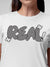Close up of 'Real' design on Women's White Round Neck T-shirt, highlighting intricate details and vibrant print.
