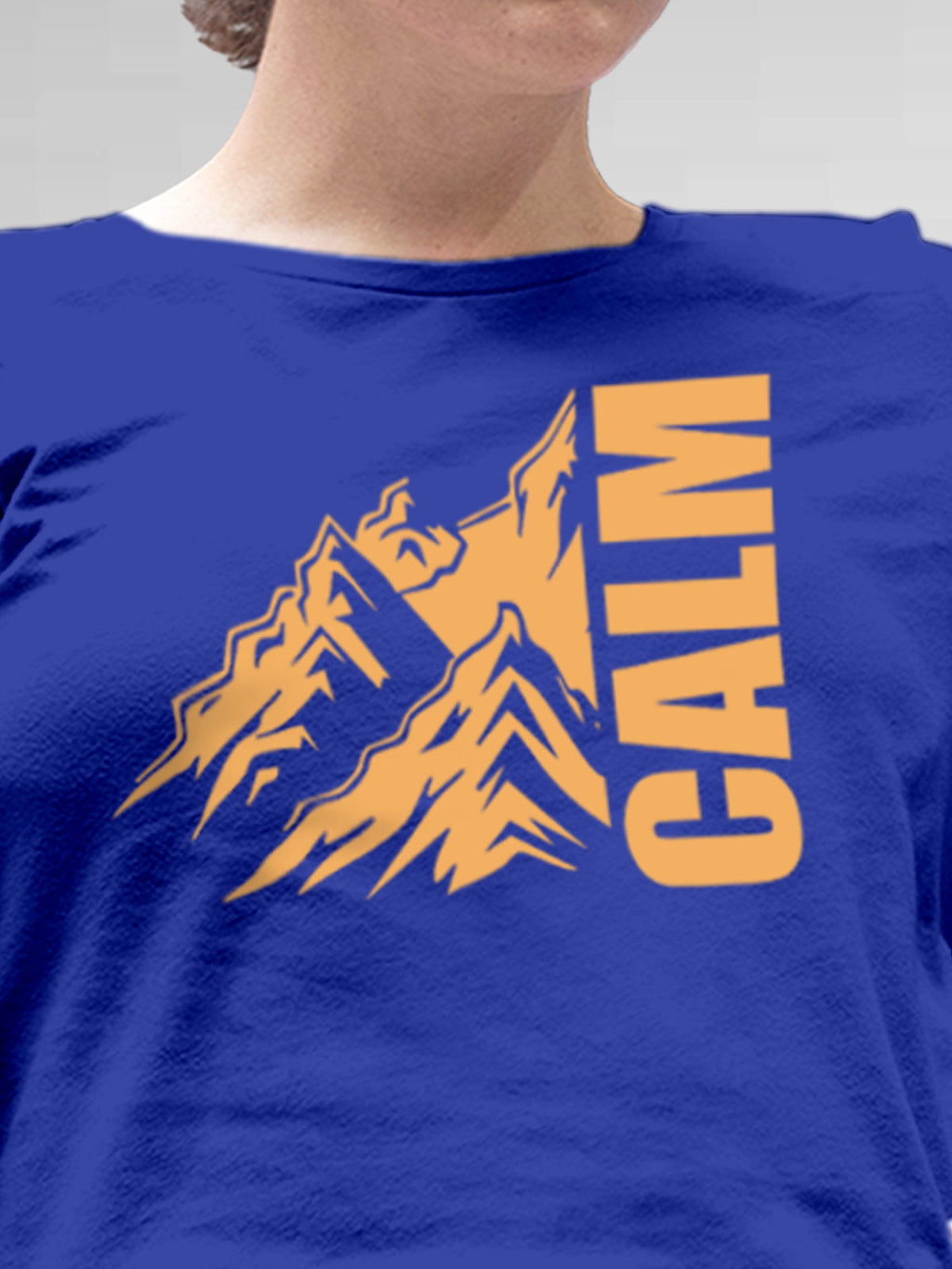 Close up of 'Calm' design on Women's Blue Round Neck T-shirt, highlighting intricate details and vibrant print.