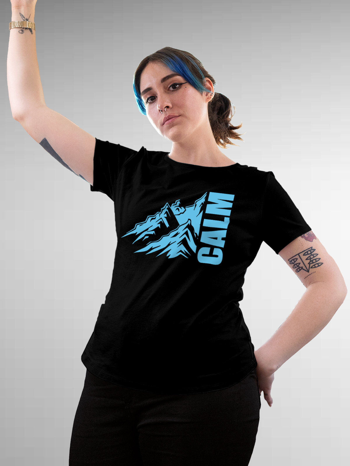 Model wearing Women's Black Round Neck T-shirt with 'Calm' design, offering effortless style and premium comfort