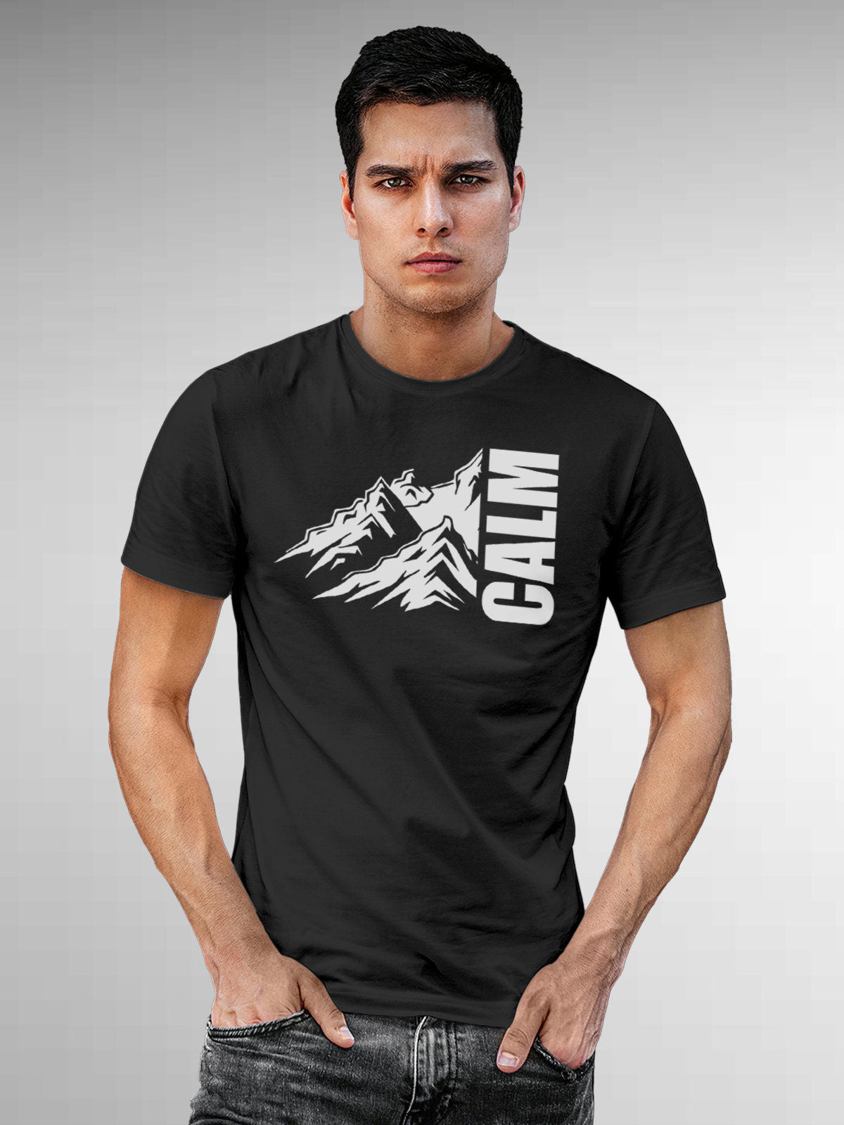 Model wearing Men's Dark Grey Round Neck T-shirt with 'Calm' design, offering effortless style and premium comfort