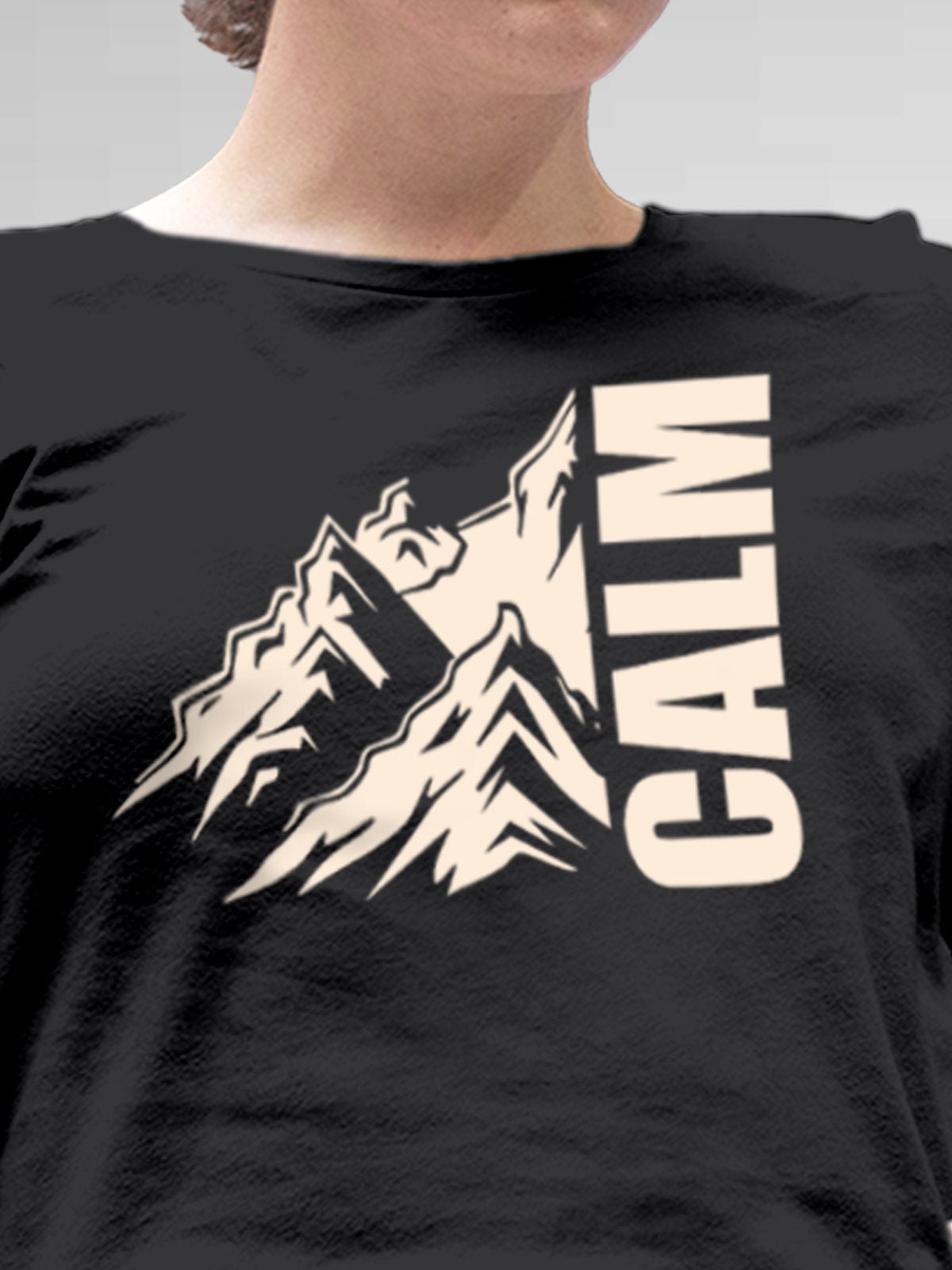 Close up of 'Calm' design on Women's Dark Grey Round Neck T-shirt, highlighting intricate details and vibrant print.