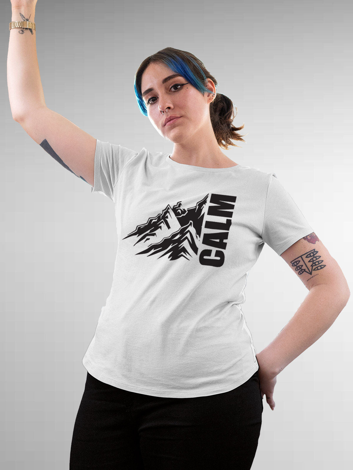 Model wearing Women's White Round Neck T-shirt with 'Calm' design, offering effortless style and premium comfort