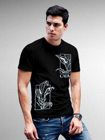 Model wearing Men's Black Round Neck T-shirt with 'Calm' design, offering effortless style and premium comfort