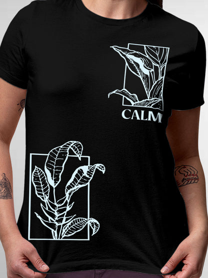 Close up of 'Calm' design on Women's Black Round Neck T-shirt, highlighting intricate details and vibrant print.