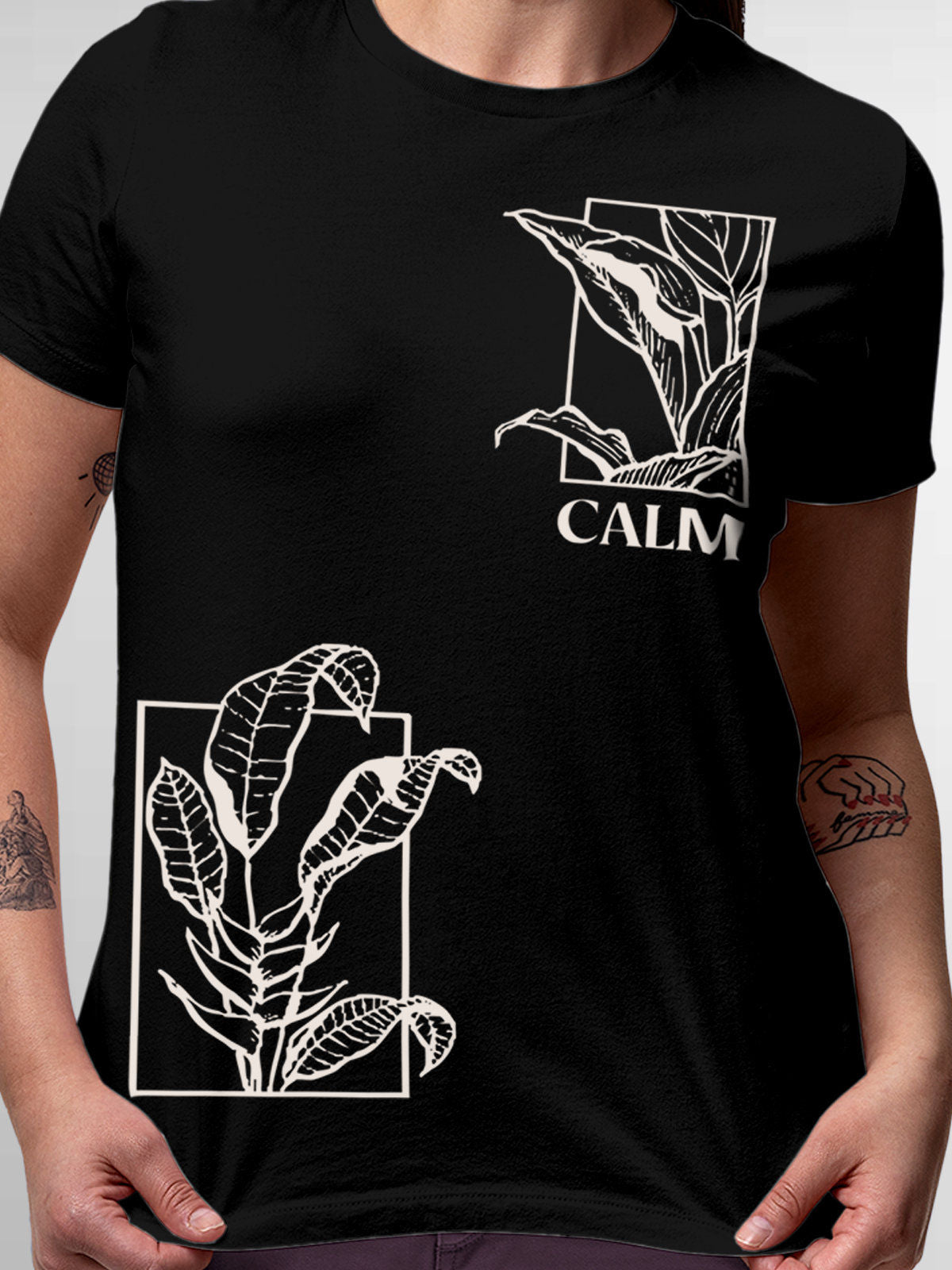 Close up of 'Calm' design on Women's Black Round Neck T-shirt, highlighting intricate details and vibrant print.
