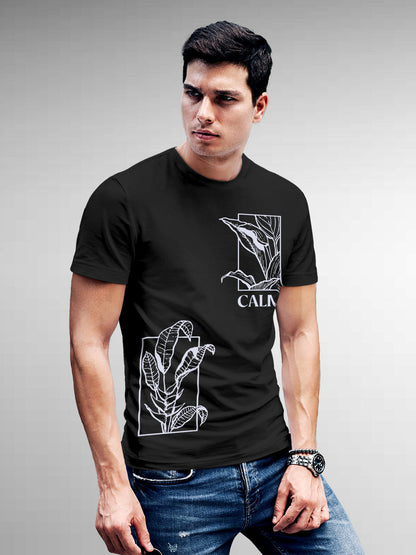 Model wearing Men's Dark Grey Round Neck T-shirt with 'Calm' design, offering effortless style and premium comfort