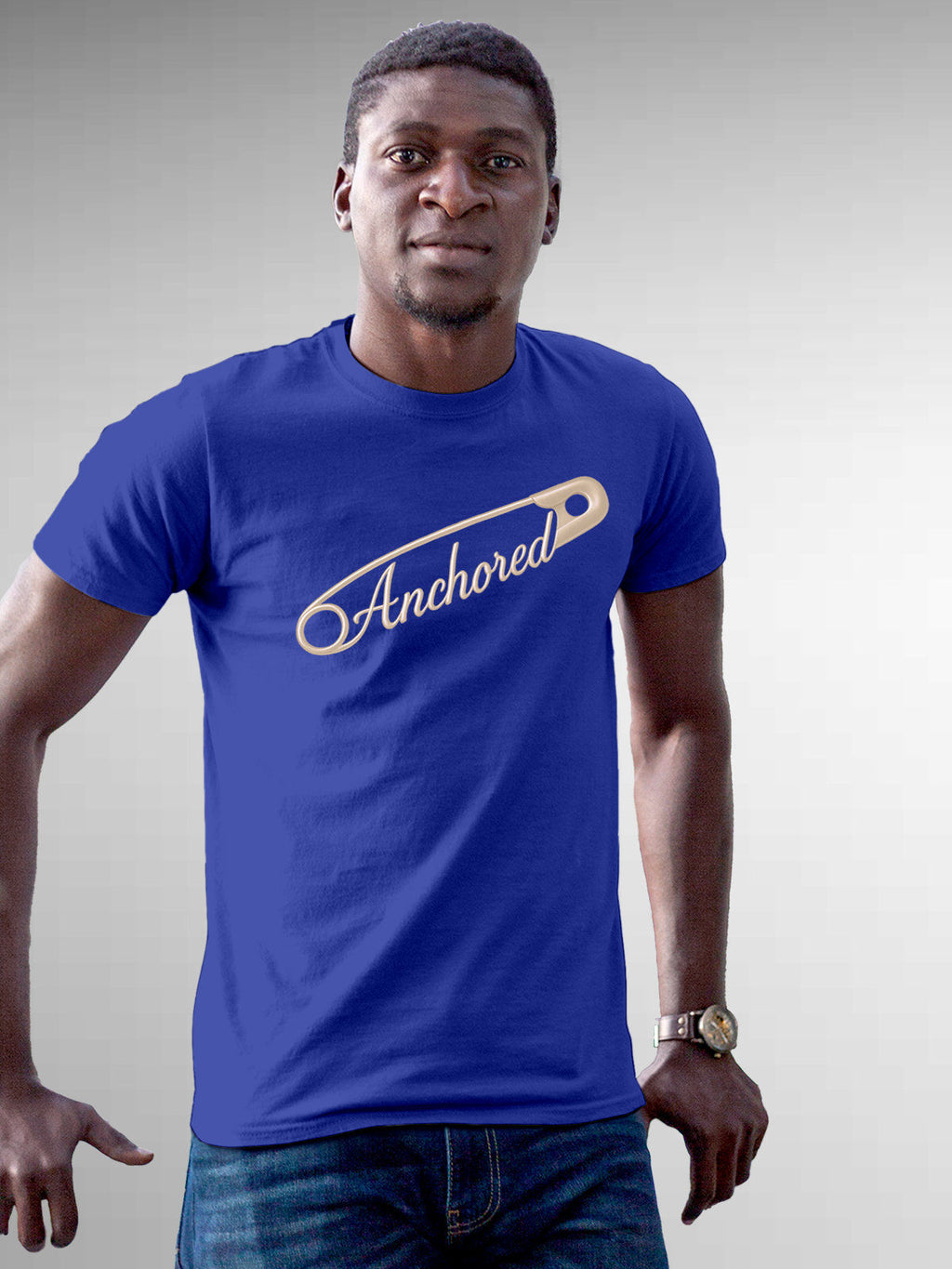 Model wearing Men's Blue Round Neck T-shirt with 'Anchored' design, offering effortless style and premium comfort