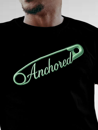 Close up of 'Anchored' design on Men's Black Round Neck T-shirt, highlighting intricate details and vibrant print.