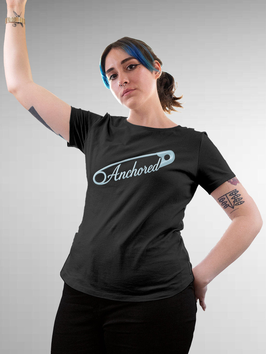 Model wearing Women's Dark Grey Round Neck T-shirt with 'Anchored' design, offering effortless style and premium comfort