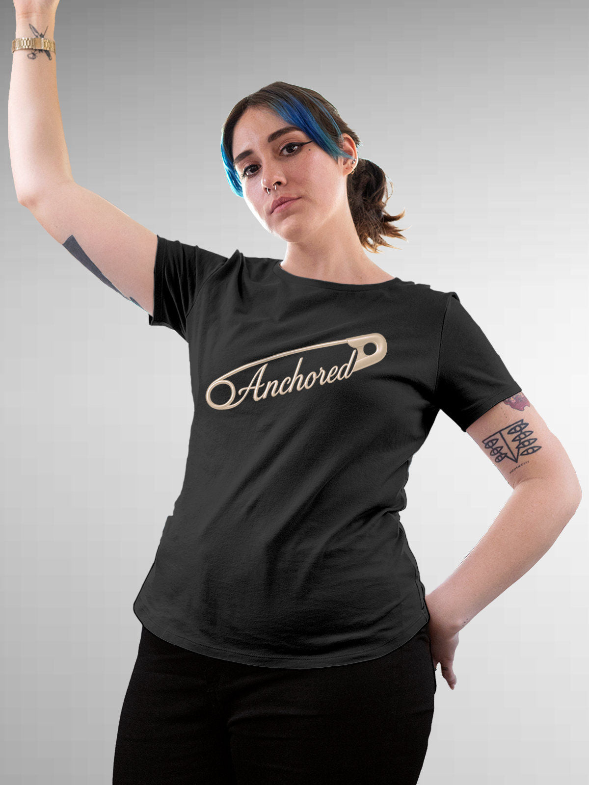 Model wearing Women's Dark Grey Round Neck T-shirt with 'Anchored' design, offering effortless style and premium comfort