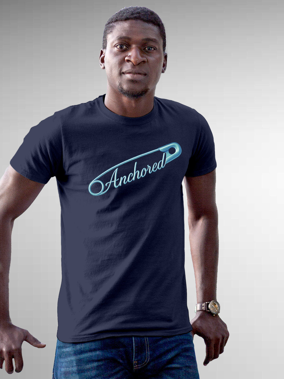 Model wearing Men's Navy Blue Round Neck T-shirt with 'Anchored' design, offering effortless style and premium comfort