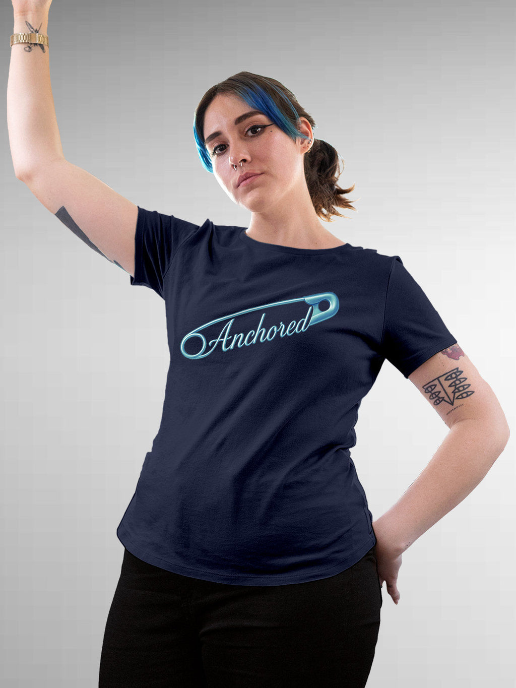 Model wearing Women's Navy Blue Round Neck T-shirt with 'Anchored' design, offering effortless style and premium comfort