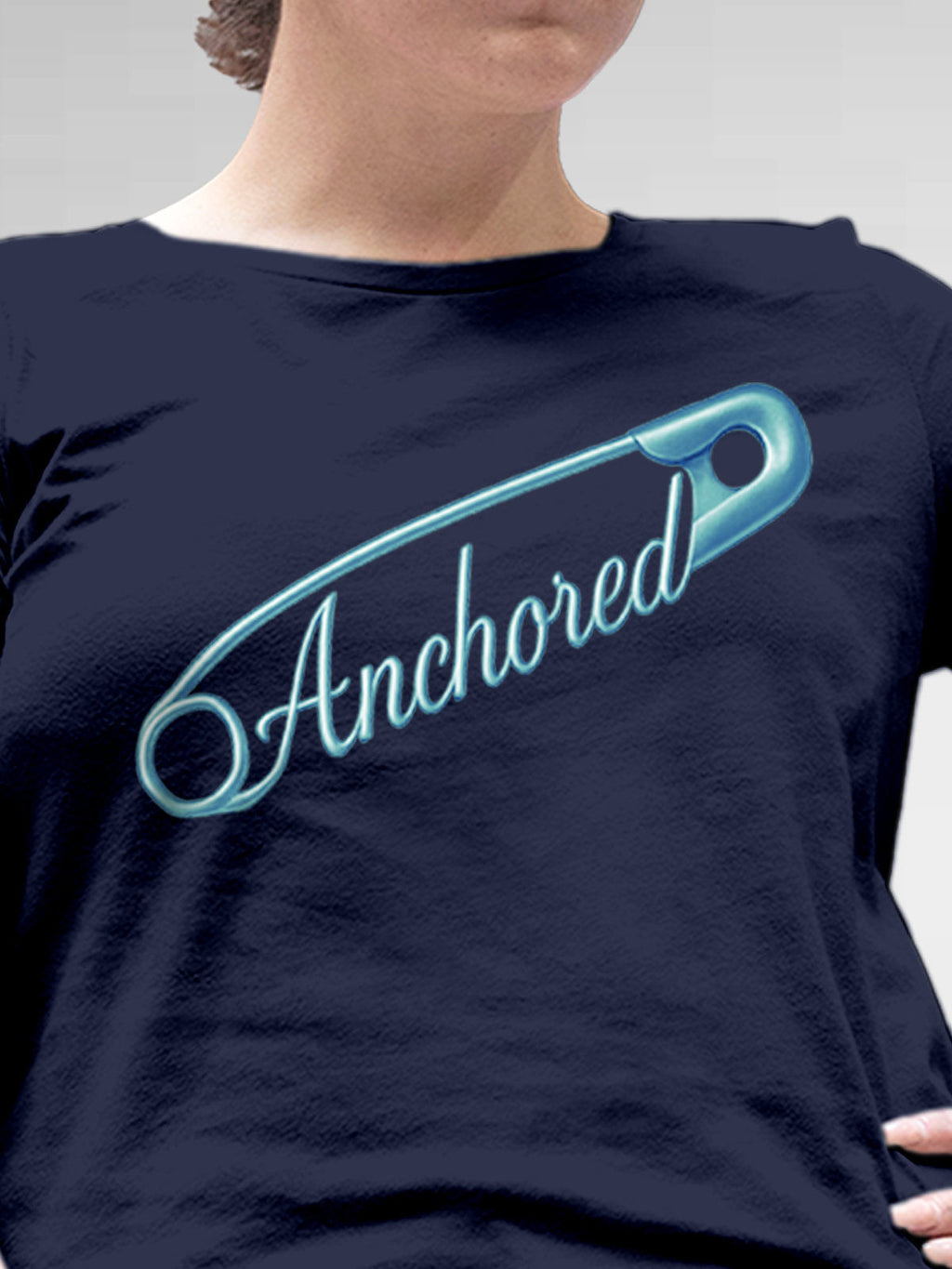 Close up of 'Anchored' design on Women's Navy Blue Round Neck T-shirt, highlighting intricate details and vibrant print.